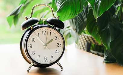 An alarm clock on a desk